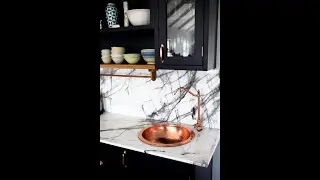 Solid copper hammered basin.