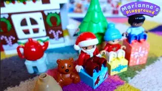 Марианна строит пряничный домик Санты из конструктора Lego Duplo для детей и малышей!