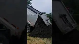 Top soil delivery to grade and plant new grass