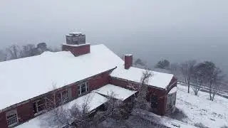 Curley Building Aerial during Snow Storm