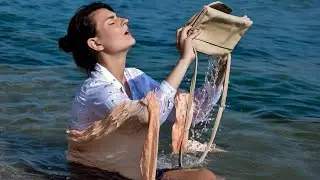 WETLOOK LOVER ROCKS HER SOAKED OFFICE OUTFIT BY THE SEA FOR WETLOOK VIDEO