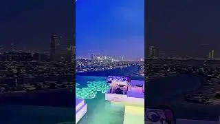 Dubai nights from a rooftop pool ✨