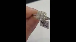 14k cushion shaped mill grained halo with ideal cut round brilliant cut centre diamond