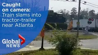 Caught on camera: Train slams into tractor-trailer near Atlanta