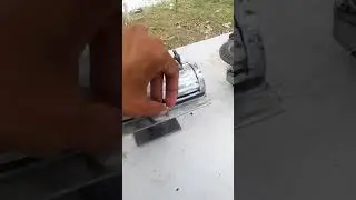 Cooking Hotdog in a mini grill