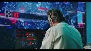 Mature programmer working in digital security center