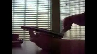 Sharpening kitchen knife with sandpaper sander block