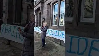 Dee reading Amu Gibb's, letter in the Guardian 