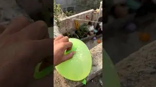 Experiment: Will a water balloon explode when it rolls down from a tall building?💥🎈#satisfying
