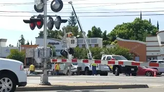 Crane Truck Lifting Damaged Signal At Bradshaw Road Railroad Crossing, SACRT Light Rail Outbound