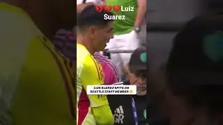 Why would you do that? Luis Suarez spits on his face. Disgusting.