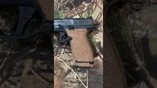 Smith & Wesson Bodyguard 2.0 wearing custom Brown Linen Textile grip tape overlay from Tractiongrips
