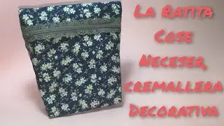 Neceser con cremallera decorativa
