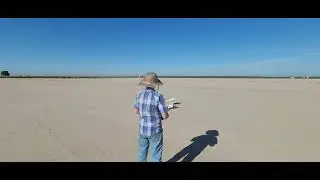 Hunter flying his remote control airplane from Vern.