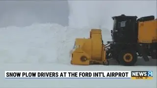 Snow plow drivers at the Ford International Airport