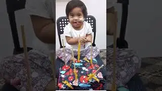 Areej is actively learning and practicing fine motor skills, showing her focus, and determination. 