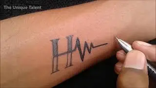Beautiful H name tattoo