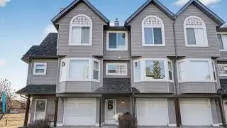 3 Bed 2.5 Bath Townhouse Attached Garage backing onto walking path leading to Nose Hill Park