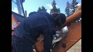 Boom hydraulic cylinder removal