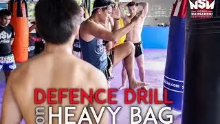 Defence Drill on Heavy Bag | Namsaknoi Muay Thai