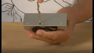 Finding the blade depth adjustment on Logan mat cutters