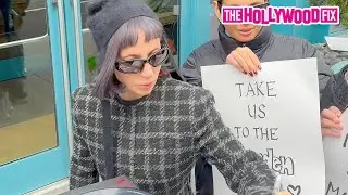 Lady Gaga Signs Autographs For Fans While Stepping Outside Her Hotel In New York, NY