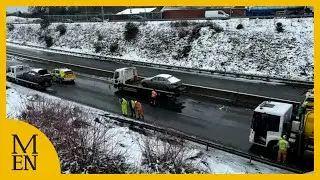 Frozen cars recovered from flooded Manchester road after a week