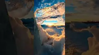 Arctic Tranquility: Embracing the Peaceful Beauty of Frozen Mountains and Sunlit Ice