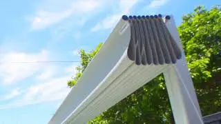 Affordable pool shading using a simple yacht rigging system from the 1950s
