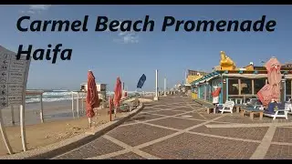 Walking in a stormy wind on the Carmel Beach Promenade in Haifa. Набережная пляжа Кармель, Хайфа