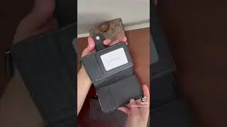 Coach Medium corner zip wallet in Signature canvass