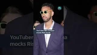 YouTuber Niko Omilana held up an &lsquo;L&rsquo; behind Rishi Sunak despite losing to him #itvnews #politics