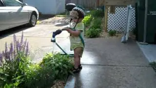 Quinn Waters the Flowers