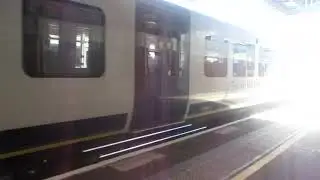 That Is a SWR Train Class 450125 450108 And 450028 In Woking