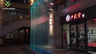 Art illuminate | fibre optic exterior waterfall curtain light project