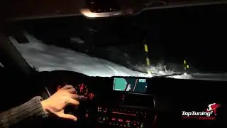 Drifting through a snowed Passo Val Parola in a Bmw Alpina D3 Touring RWD