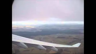 airplane climbing through the clouds