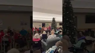 Choir performance at our memory care facility, Crystal Woods! 🎶