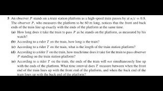 An observer stands on a train station platform as a high-speed train passes by at The observer , who