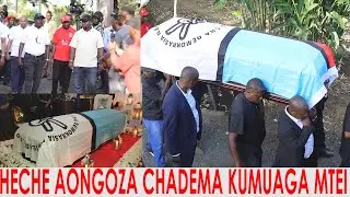 WANANCHI NA JOHN  HECHE WAINGIA BARABARANI ARUSHA KUSINDIKIZA MWILI WA MZEE MTEI 