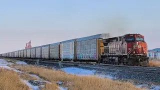 CP stack train with nice K3L horn show Westbound at Carseland, AB on the Brooks Subdivision.