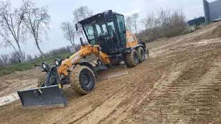nivellement de plate-forme avec niveleuse Case 800c