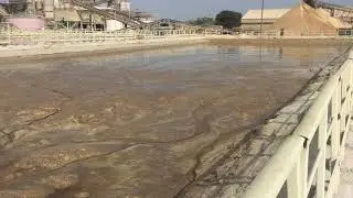 Industrial pond cleaning with hydraulic  barge robotic system
