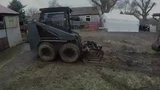 Skid steer unloading straw
