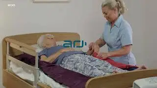 Dressing with slide sheets | Patient&nbsp;Handling​ | Arjo Global