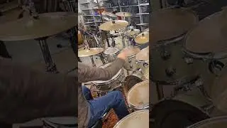 Drumming along the horn section of a funky disco track