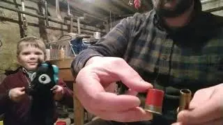 Loading black powder shotgun shells with rag wads.