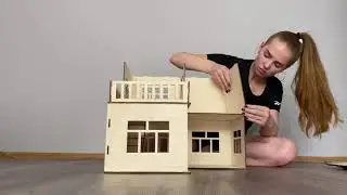 Putting together a dollhouse | Eco-friendly toys for children