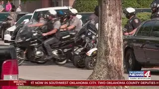 Law enforcement procession escorts body of fallen deputy