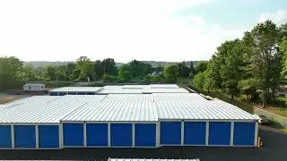 aerial reveal of self storage unit building wareh 2023 11 27 05 22 35 utc